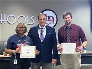 teachers Elisia Jemison and Jonathan Bailey with Dr. Nichols